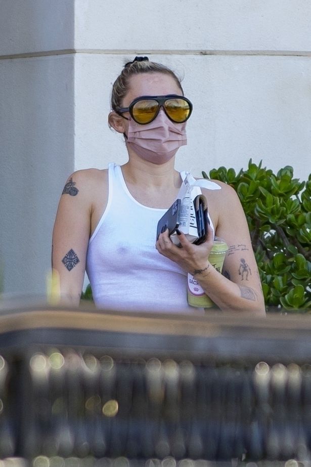 Miley Cyrus Turns Heads As She Steps Out In A Completely See Through Tank Top
