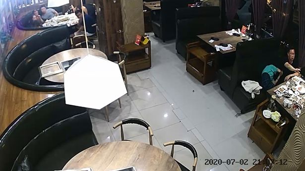 husband knocks out cheating wife in one slap in front of lovers in a restaurant