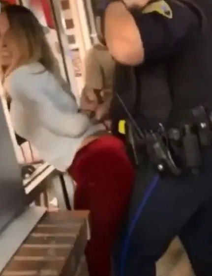 woman filmed grinding on police officer as he tries to arrest her
