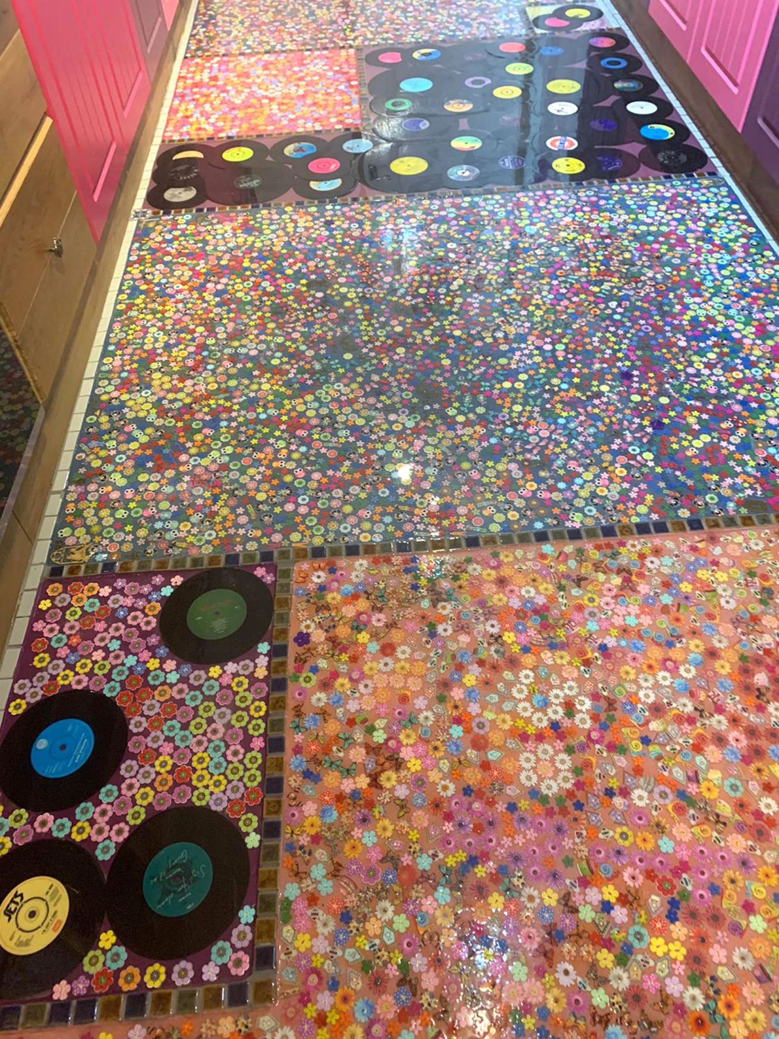 woman turns cheating ex-husband's vinyl records into her kitchen floor