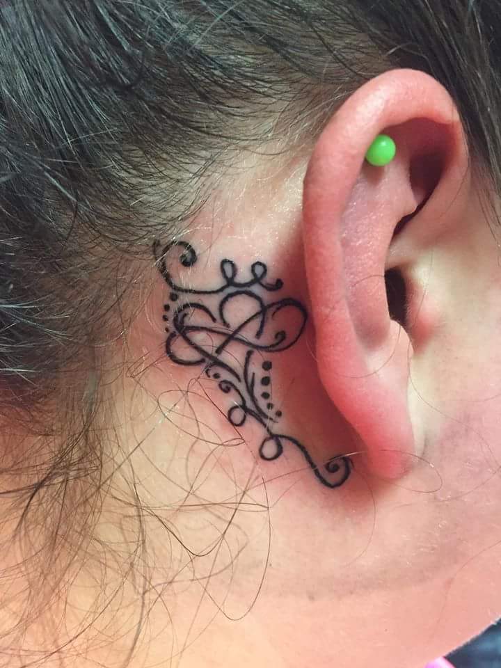 75 best unconventional ear tattoo ideas to drool over