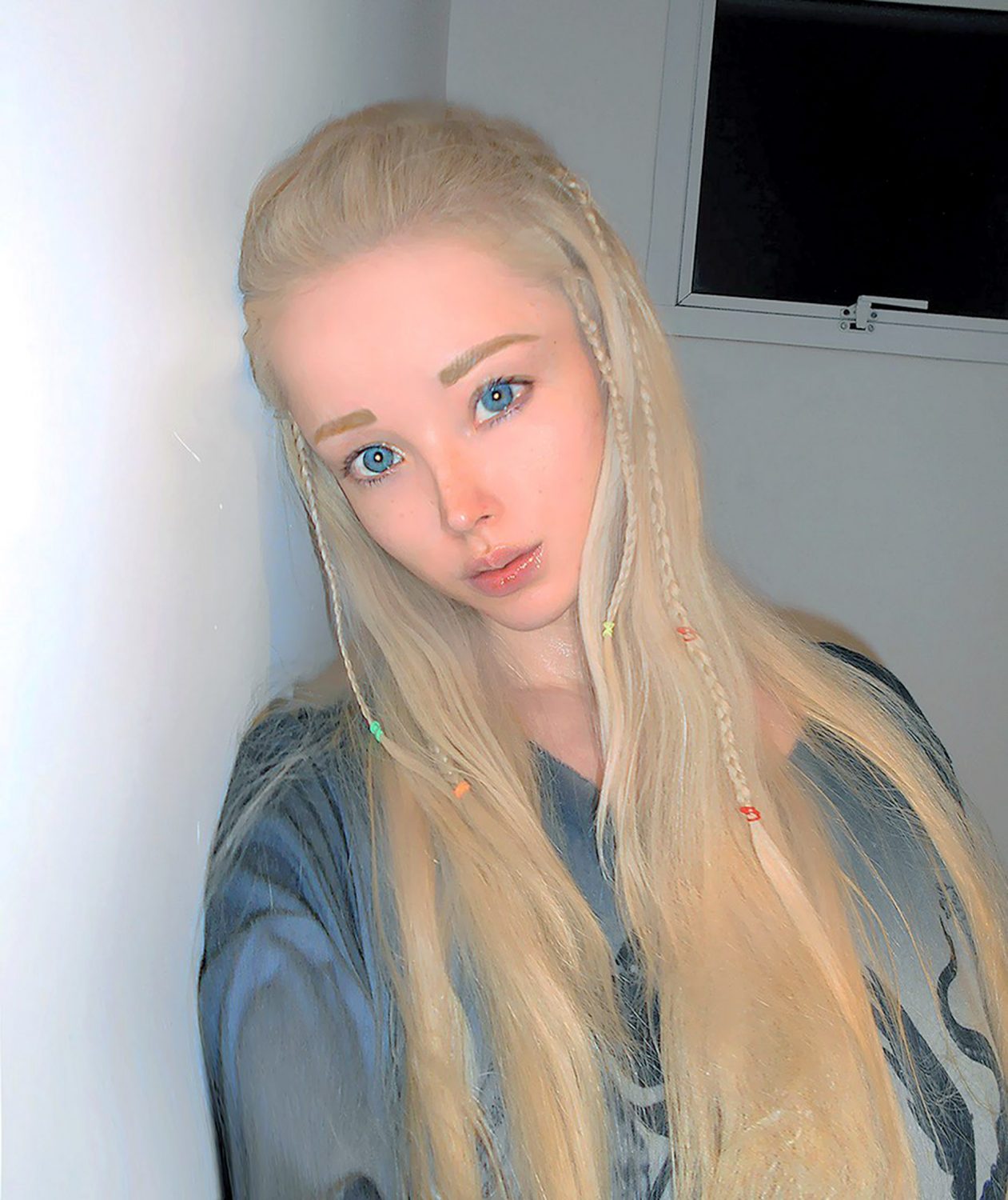 the woman who tries to look exactly like a barbie doll posted pics without makeup