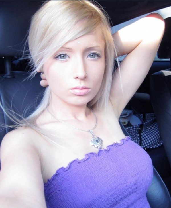 the woman who tries to look exactly like a barbie doll posted pics without makeup