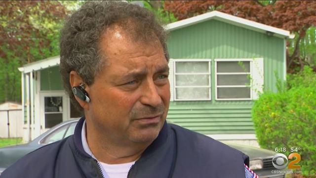 hero mailman sees infant alone in street, bursts through door to find mom hunched over stroller