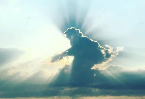 majestic clouds appear to reveal the face of jesus