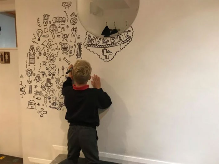 nine-year-old boy told not to doodle in class lands job to decorate restaurant with his drawings