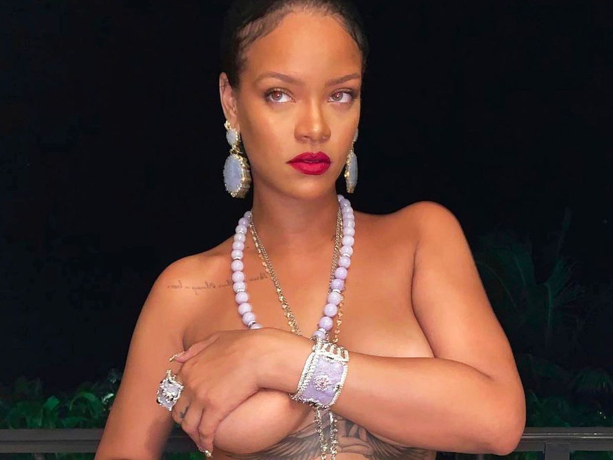 rihanna goes topless as she ditches bra for sizzling poolside snap in red-hot display