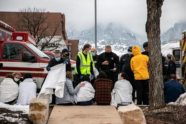 the internet is angry at the way cops escorted colorado shooting suspect to car