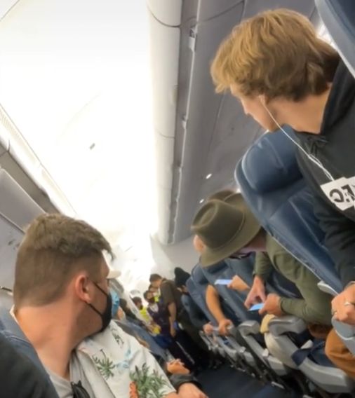 tiktok video captures passengers' reactions after woman gives birth mid-flight