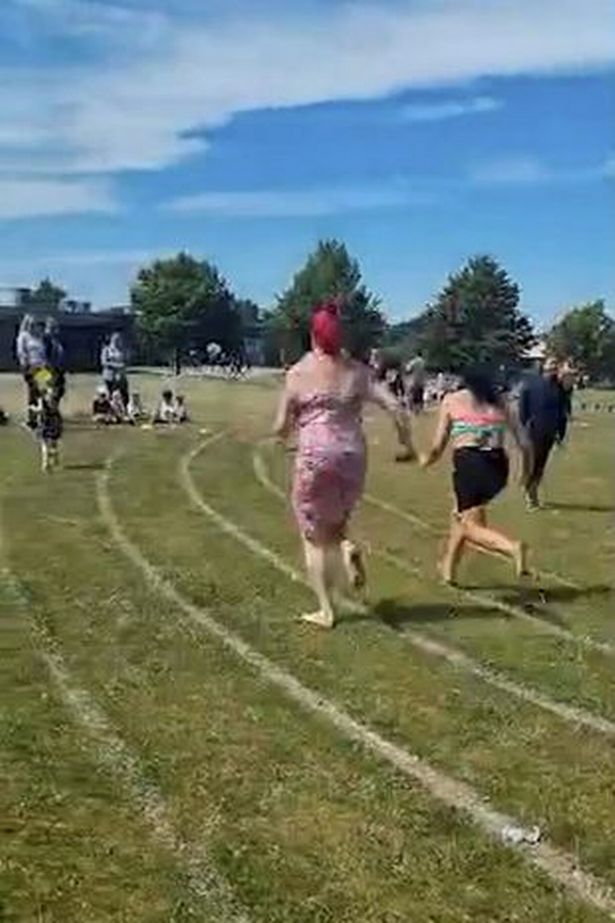 Moment Competitive Mother Pushes Another Mom Over At School Race