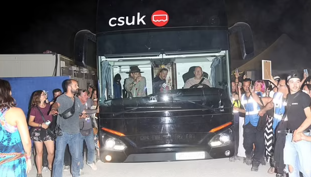 Worn-out Johnny Depp Waves At Fans From Tour Bus Following Munich Gig
