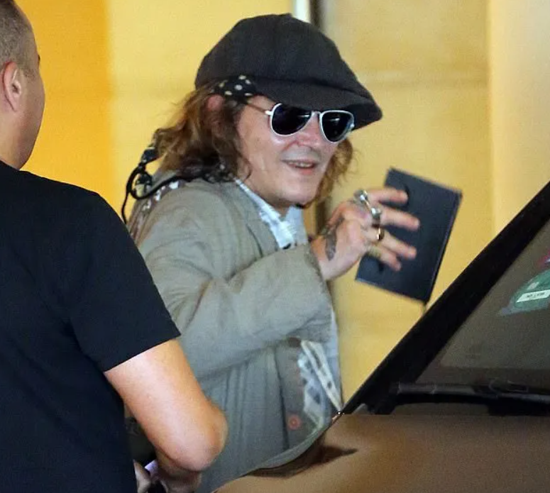 Johnny Depp Dons A Suede Fringe Jacket And Styles His Hair In Braids