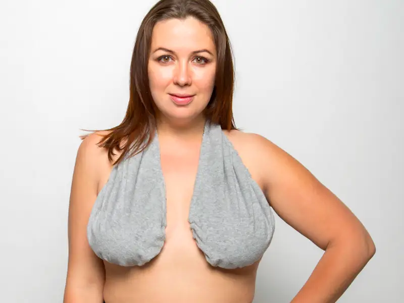 The Ta-Ta Towel Is The Literal Over-The-Shoulder Boulder Holder You Need In  Your Life
