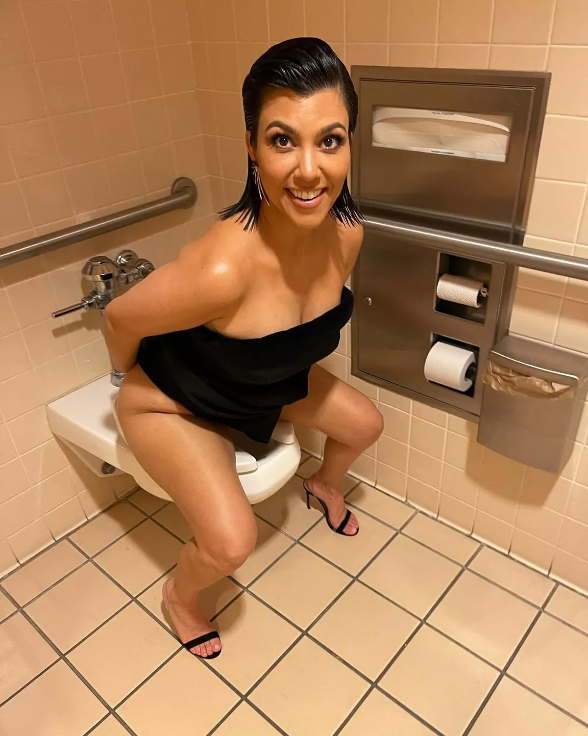 Travis Barker Criticized For Sharing Photo Of Kourtney Kardashian Squatting On Toilet Without Pants